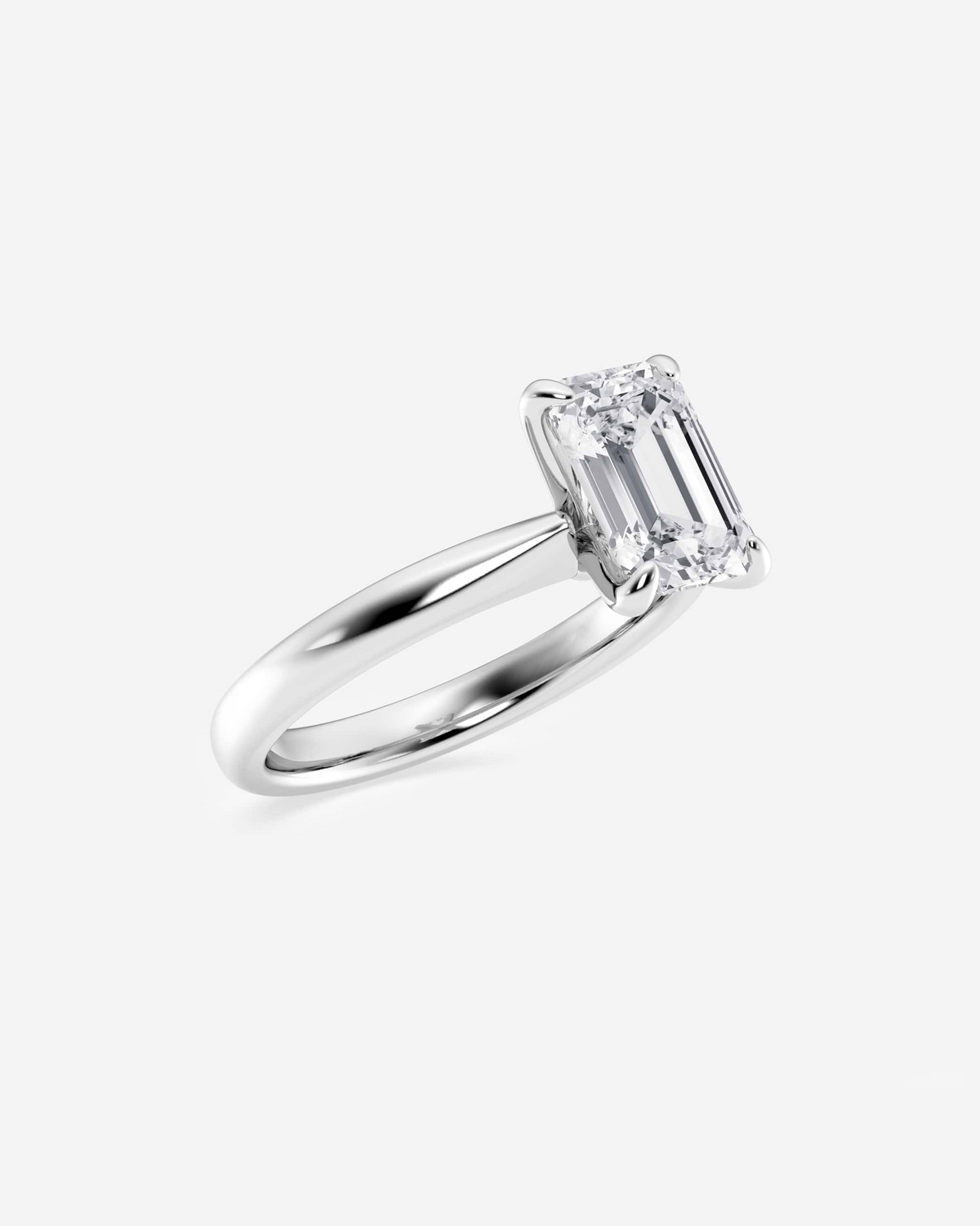 Pavique emerald solitaire ring