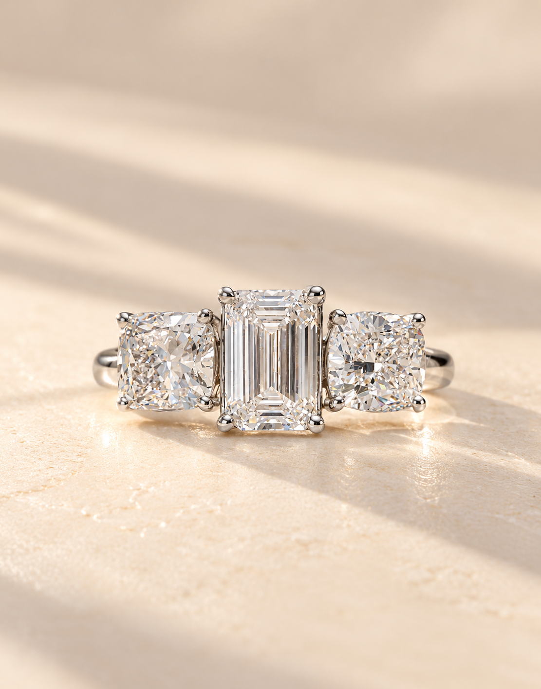 Three stone_diamond_ring_on_cream