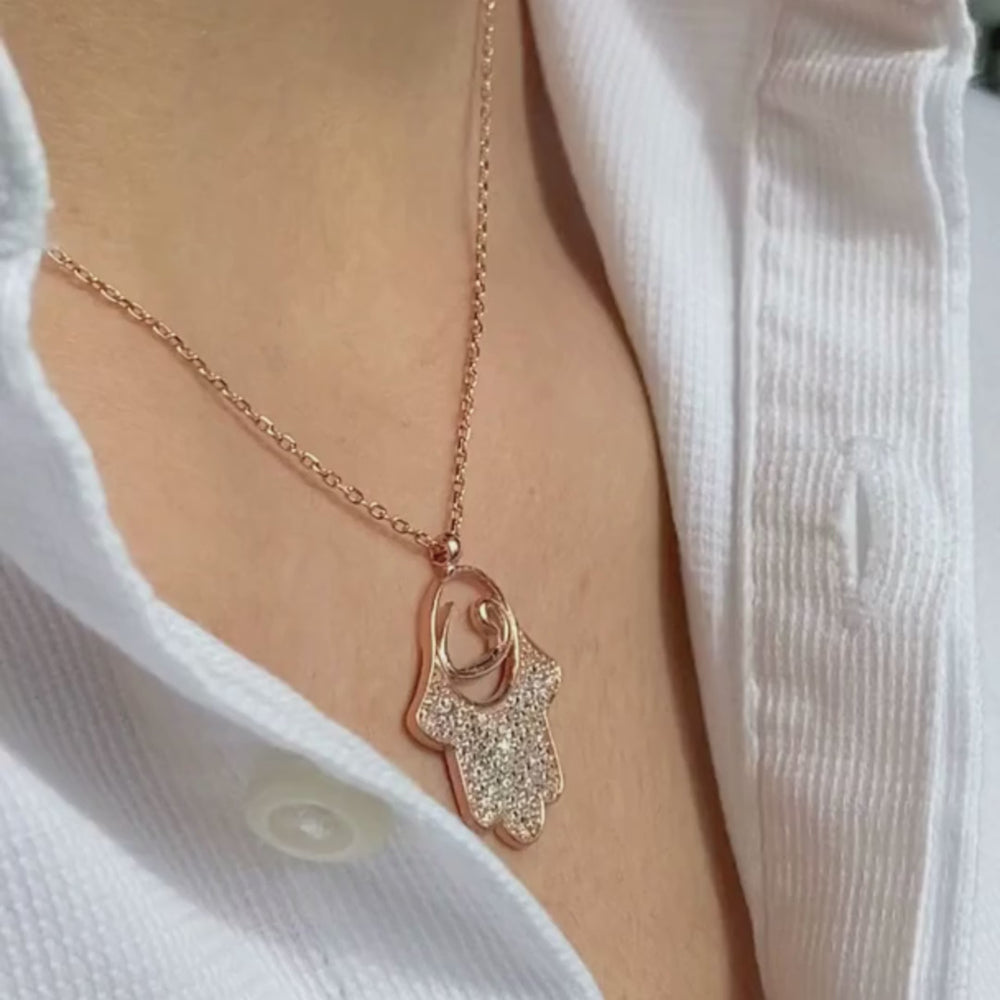 
            
                Load and play video in Gallery viewer, Elegant Hamsa Silver Necklace Rosegold
            
        